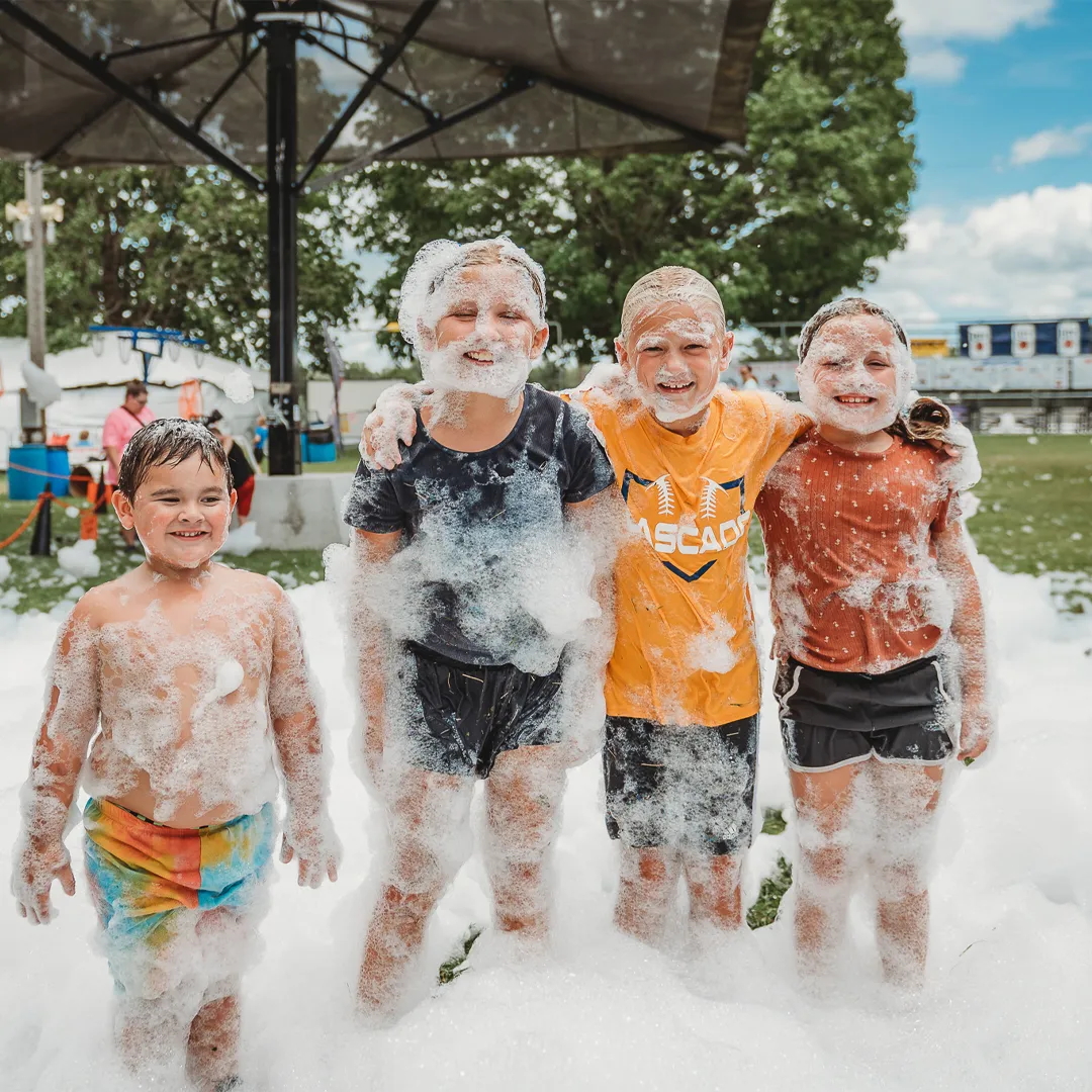 Kids having fun in bubbles